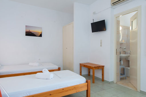 The bedroom at Roubina accommodation in Sifnos